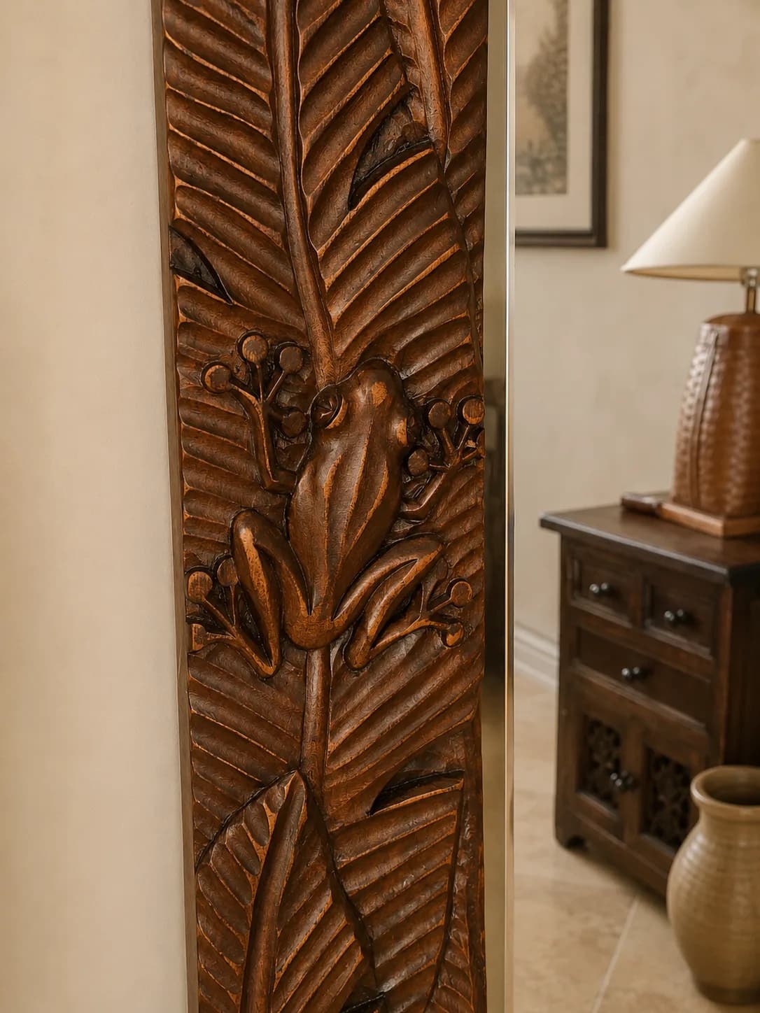 Close view of hand-carved leaf detailing in wood